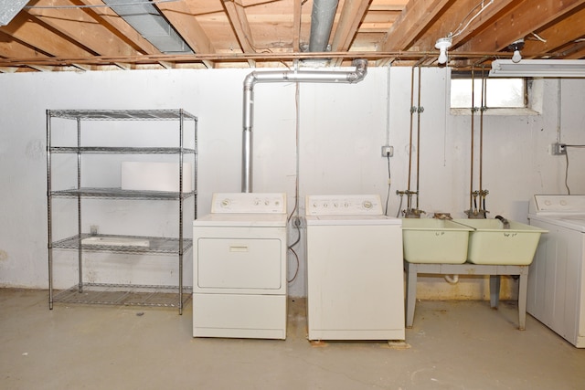 washroom featuring washer and dryer