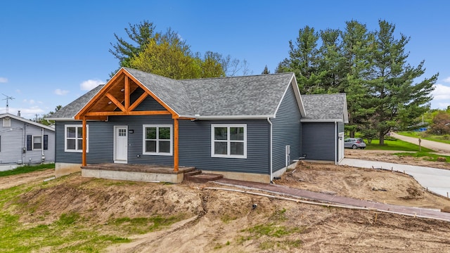 10820 Baker Rd, Jerome, MI 49249 - view of front facade featuring roof with shingles