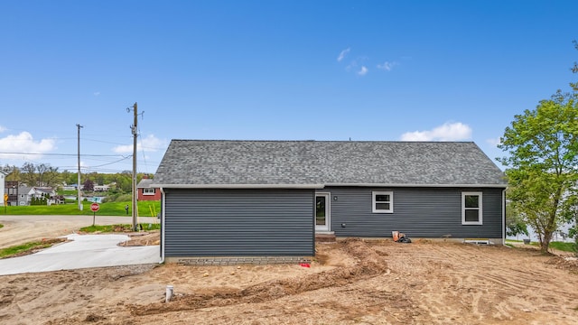 10820 Baker Rd, Jerome, MI 49249 - view of side of property with roof with shingles