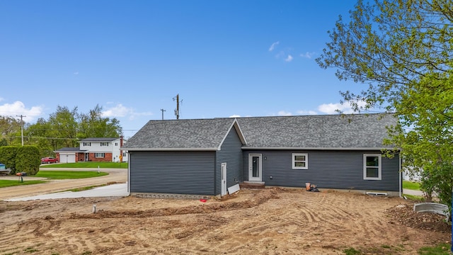 10820 Baker Rd, Jerome, MI 49249 - back of house with a shingled roof
