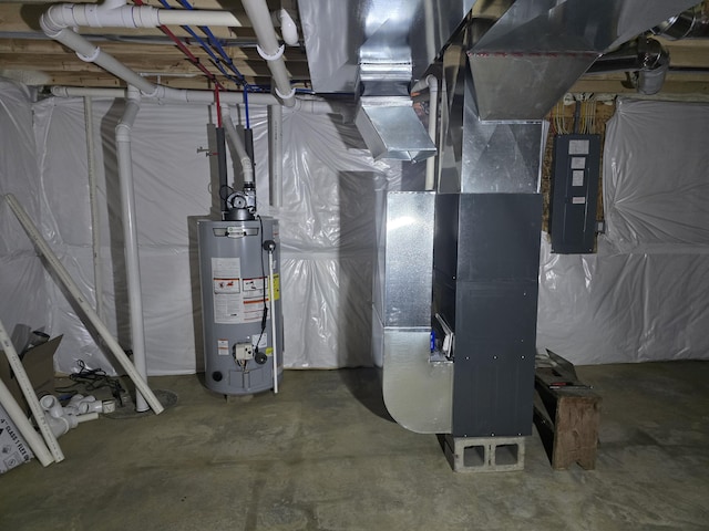 10820 Baker Rd, Jerome, MI 49249 - utility room featuring water heater and electric panel