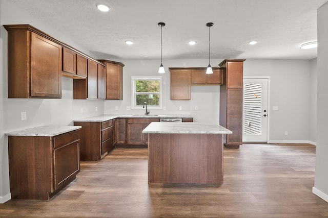 10820 Baker Rd, Jerome, MI 49249 - kitchen featuring a center island, dark wood-type flooring, pendant lighting, baseboards, and recessed lighting