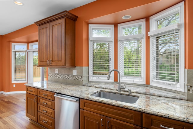 24160 Argyle St, Novi, MI 48374 - kitchen with a sink, stainless steel dishwasher, light wood finished floors, healthy amount of natural light, and recessed lighting