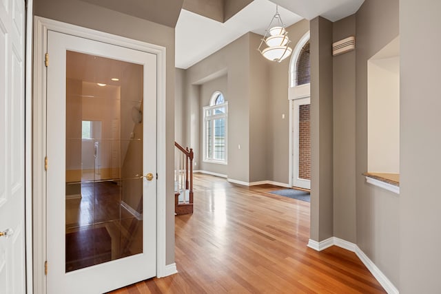 24160 Argyle St, Novi, MI 48374 - foyer with wood finished floors, baseboards, and stairs