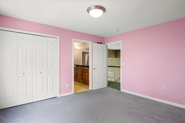 24160 Argyle St, Novi, MI 48374 - unfurnished bedroom featuring carpet flooring, baseboards, a closet, and ensuite bath