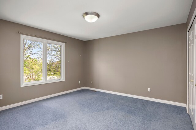 24160 Argyle St, Novi, MI 48374 - spare room with dark carpet and baseboards
