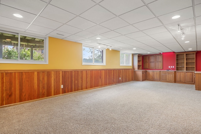 24160 Argyle St, Novi, MI 48374 - below grade area with wainscoting, light carpet, bar, recessed lighting, and wood walls