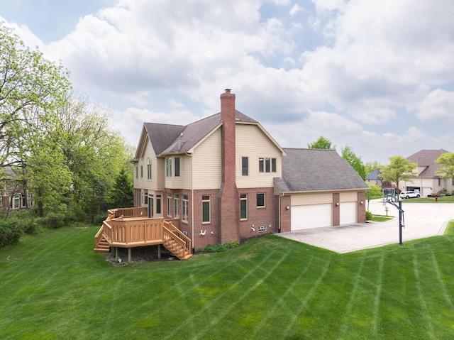 24160 Argyle St, Novi, MI 48374 - back of property with brick siding, a yard, a deck, and concrete driveway