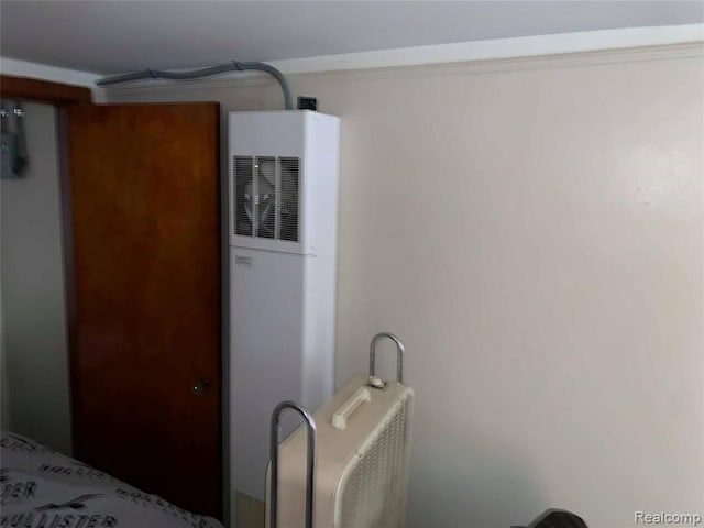 bedroom featuring a heating unit