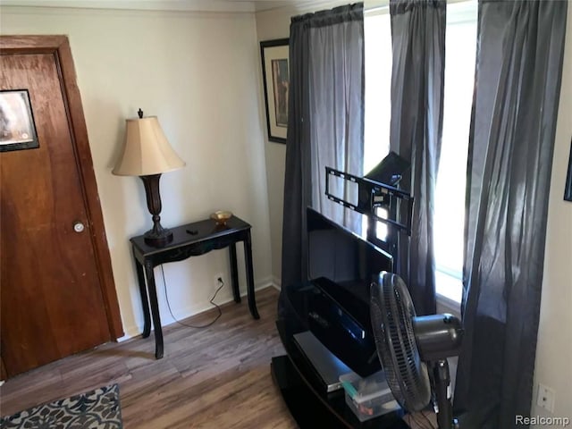 office area featuring wood finished floors and baseboards