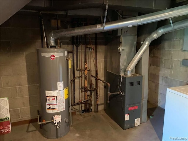 utility room featuring washer / clothes dryer and gas water heater