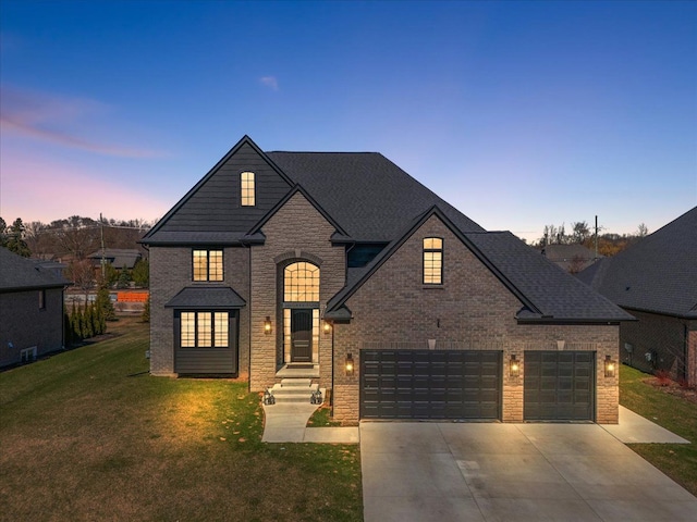 14105 Jode Park, Shelby Twp, MI 48315 - view of front facade with concrete driveway, a front lawn, stone siding, and brick siding