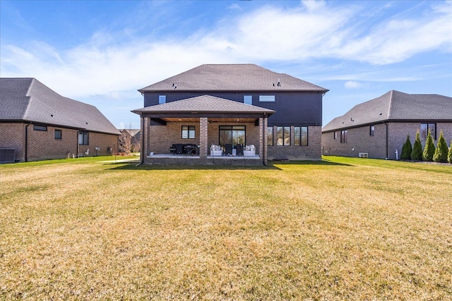 14105 Jode Park, Shelby Twp, MI 48315 - rear view of house featuring brick siding, a lawn, central air condition unit, and a patio