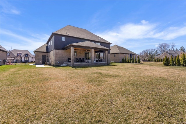 14105 Jode Park, Shelby Twp, MI 48315 - back of house with a gazebo, brick siding, and a lawn
