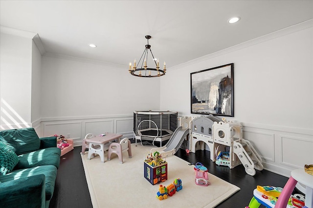 14105 Jode Park, Shelby Twp, MI 48315 - playroom featuring a decorative wall, a chandelier, ornamental molding, a wainscoted wall, and recessed lighting
