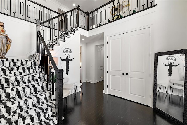 14105 Jode Park, Shelby Twp, MI 48315 - foyer entrance with stairway, a high ceiling, baseboards, and dark wood-style floors