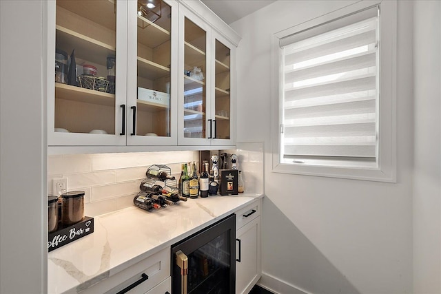 14105 Jode Park, Shelby Twp, MI 48315 - indoor dry bar featuring wine cooler and backsplash