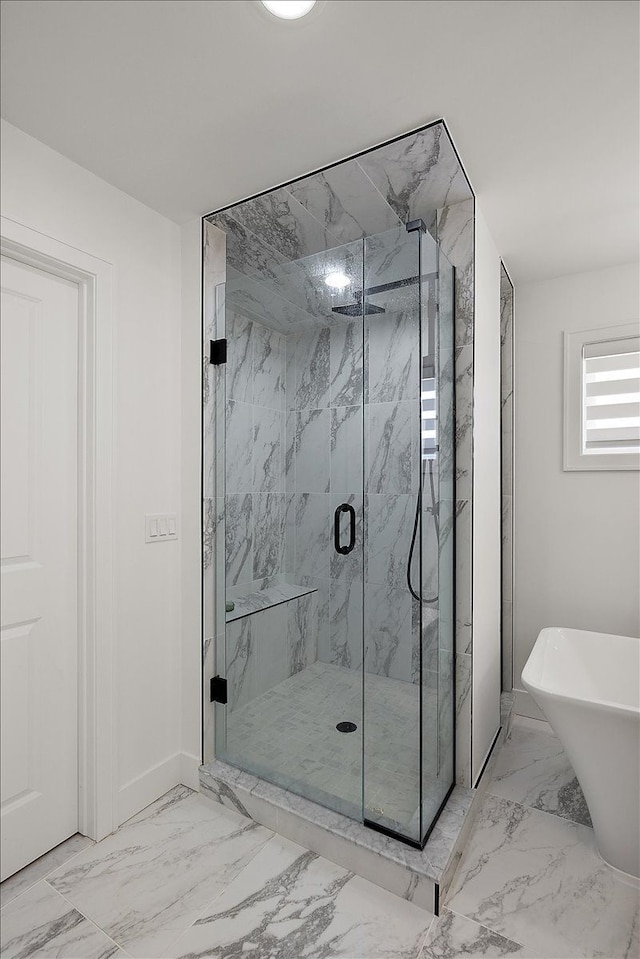 14105 Jode Park, Shelby Twp, MI 48315 - full bath featuring marble look tiles, a freestanding bath, a marble finish shower, and baseboards