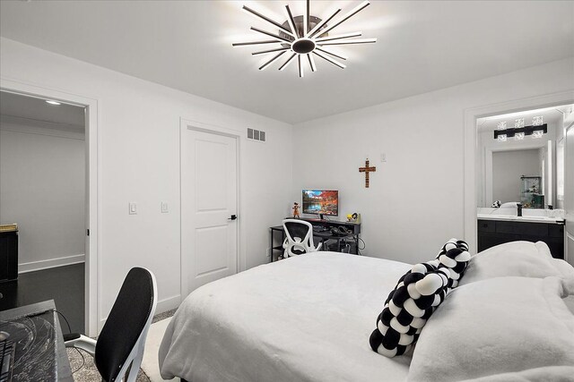 14105 Jode Park, Shelby Twp, MI 48315 - bedroom featuring carpet floors, a chandelier, ensuite bath, and baseboards