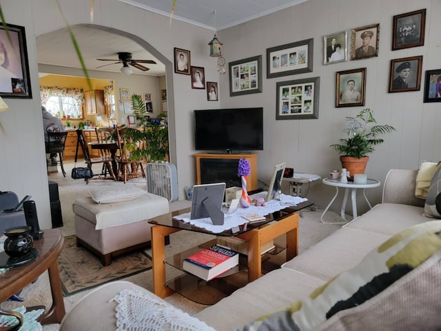 927 George St S, Jackson, MI 49202 - carpeted living area featuring a ceiling fan and crown molding