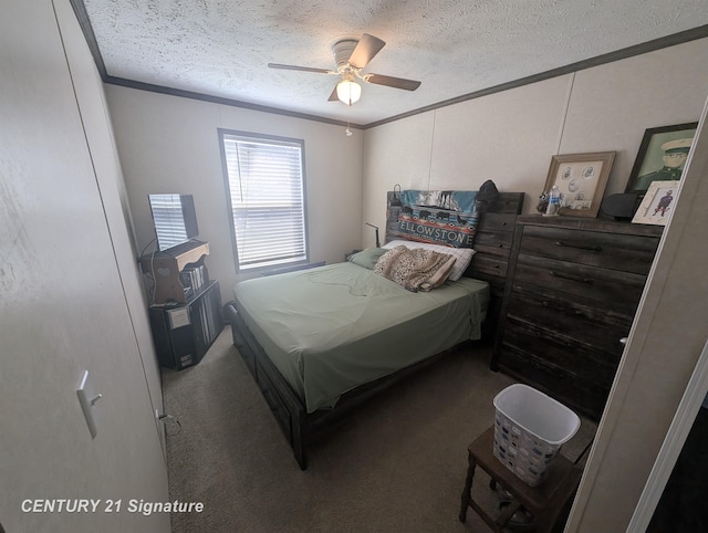 carpeted bedroom featuring a ceiling fan, a textured ceiling, and crown molding