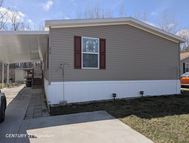 view of property exterior with a carport