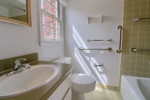 full bath with bathtub / shower combination, vanity, toilet, and tile patterned flooring