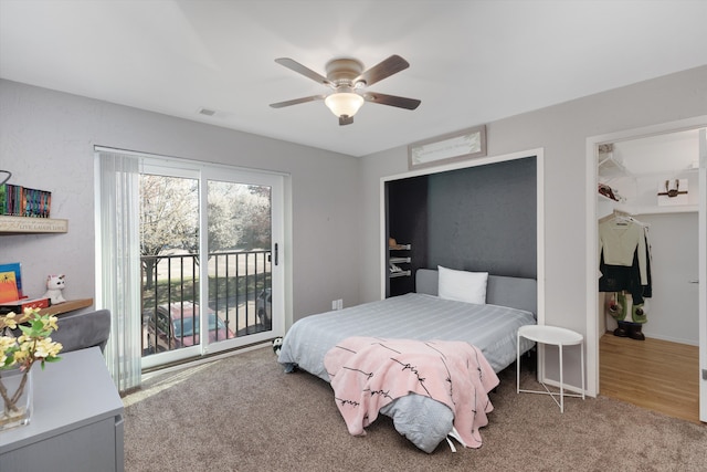 bedroom featuring visible vents, carpet flooring, access to outside, and ceiling fan