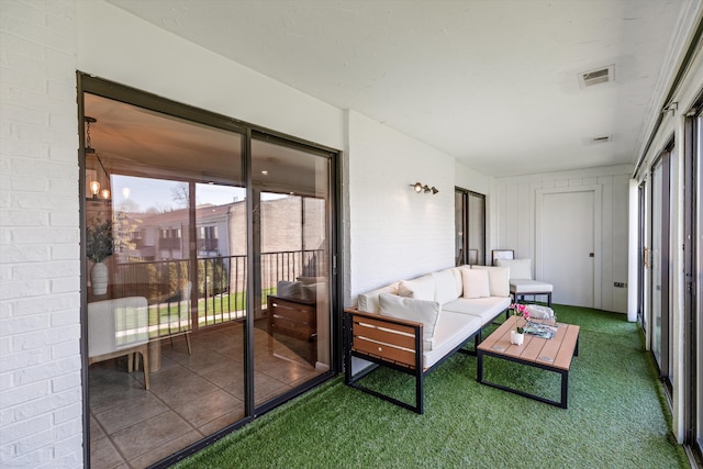sunroom / solarium featuring outdoor lounge area and visible vents