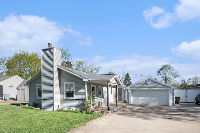 single story home with a garage, a chimney, and a front yard