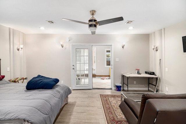 bedroom featuring a ceiling fan, visible vents, recessed lighting, and light wood-style floors