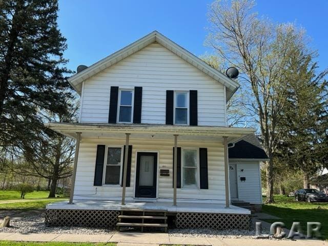 view of front of property featuring covered porch
