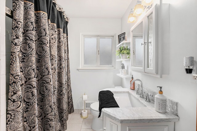 bathroom featuring vanity, toilet, tile patterned flooring, a shower with shower curtain, and visible vents
