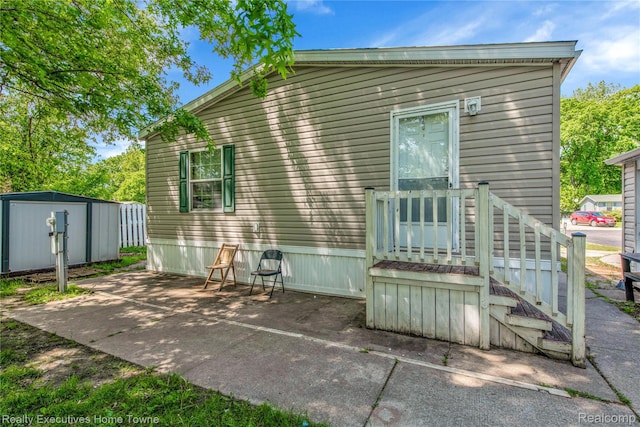 1822 Elizabeth Ter, Madison Heights, MI 48071 - back of property with a patio