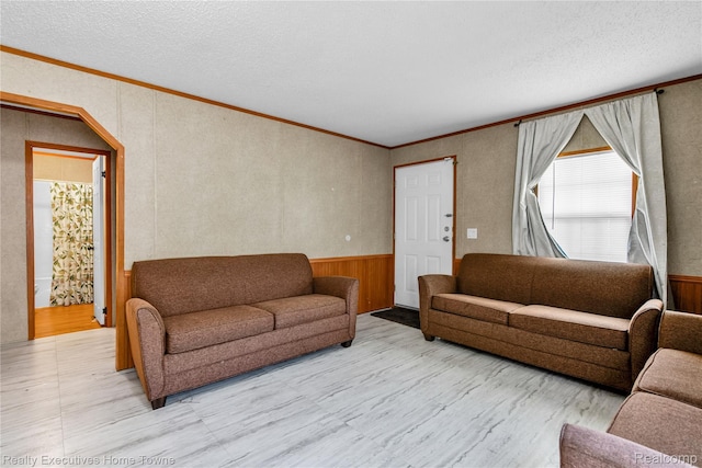 1822 Elizabeth Ter, Madison Heights, MI 48071 - living area featuring wainscoting, crown molding, and a textured ceiling