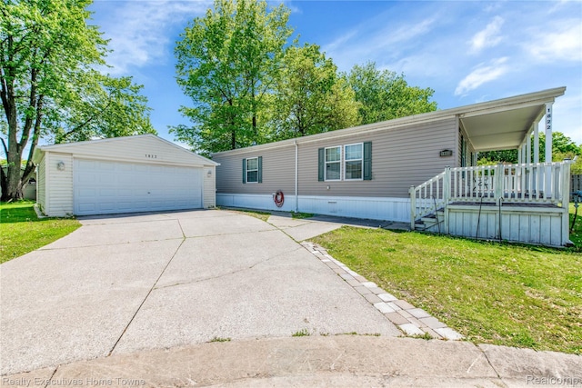 1822 Elizabeth Ter, Madison Heights, MI 48071 - view of front of property with a front yard, an outdoor structure, and a detached garage
