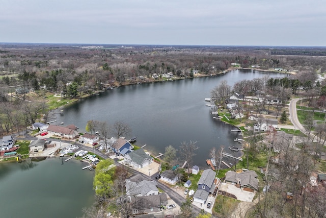 birds eye view of property featuring a water view and a residential view