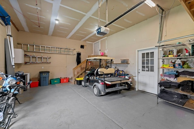 garage featuring a garage door opener