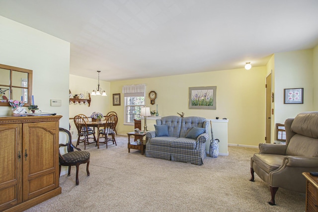 3669 Brentwood St, Norton Shores, MI 49441 - living area with light carpet and an inviting chandelier