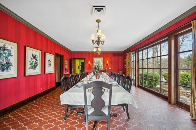 2801 Niles Buchanan Rd, Buchanan, MI 49107 - dining space featuring an inviting chandelier, ornamental molding, visible vents, and baseboards