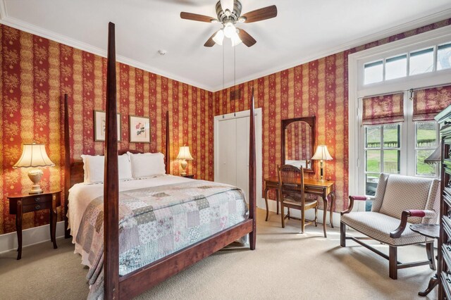 2801 Niles Buchanan Rd, Buchanan, MI 49107 - carpeted bedroom with wallpapered walls, ornamental molding, and multiple windows