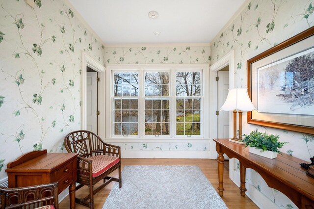 2801 Niles Buchanan Rd, Buchanan, MI 49107 - sitting room with wallpapered walls, light wood-style floors, and crown molding