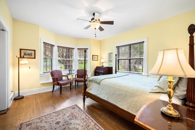 2801 Niles Buchanan Rd, Buchanan, MI 49107 - bedroom featuring baseboards, a ceiling fan, and wood finished floors