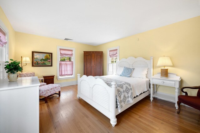 2801 Niles Buchanan Rd, Buchanan, MI 49107 - bedroom featuring light wood-type flooring, visible vents, and baseboards