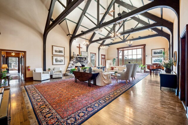 2801 Niles Buchanan Rd, Buchanan, MI 49107 - living area with a chandelier, hardwood / wood-style floors, and high vaulted ceiling