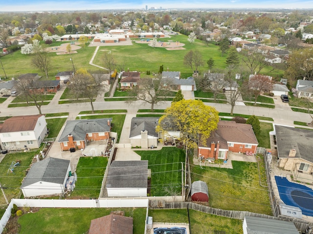 birds eye view of property with a residential view