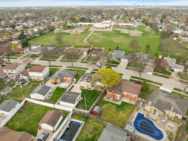 birds eye view of property with a residential view