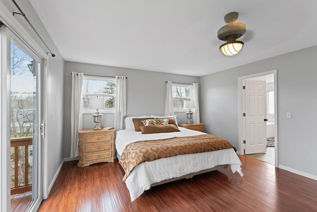 16191 Seymour Rd, Argentine, MI 48451 - bedroom featuring wood finished floors, baseboards, and access to outside