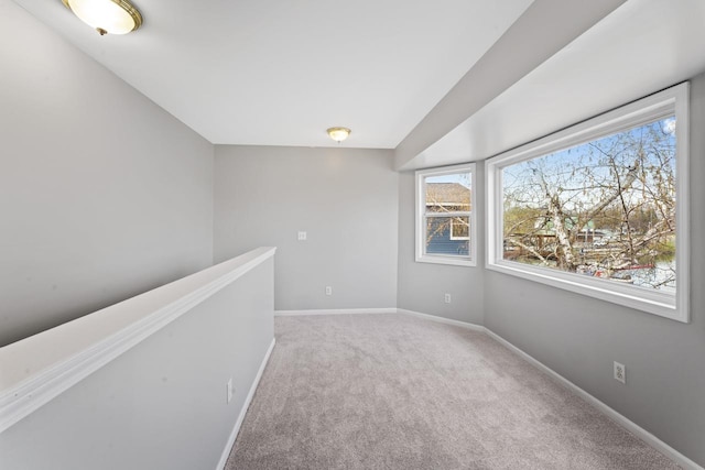 16191 Seymour Rd, Argentine, MI 48451 - carpeted empty room with healthy amount of natural light and baseboards