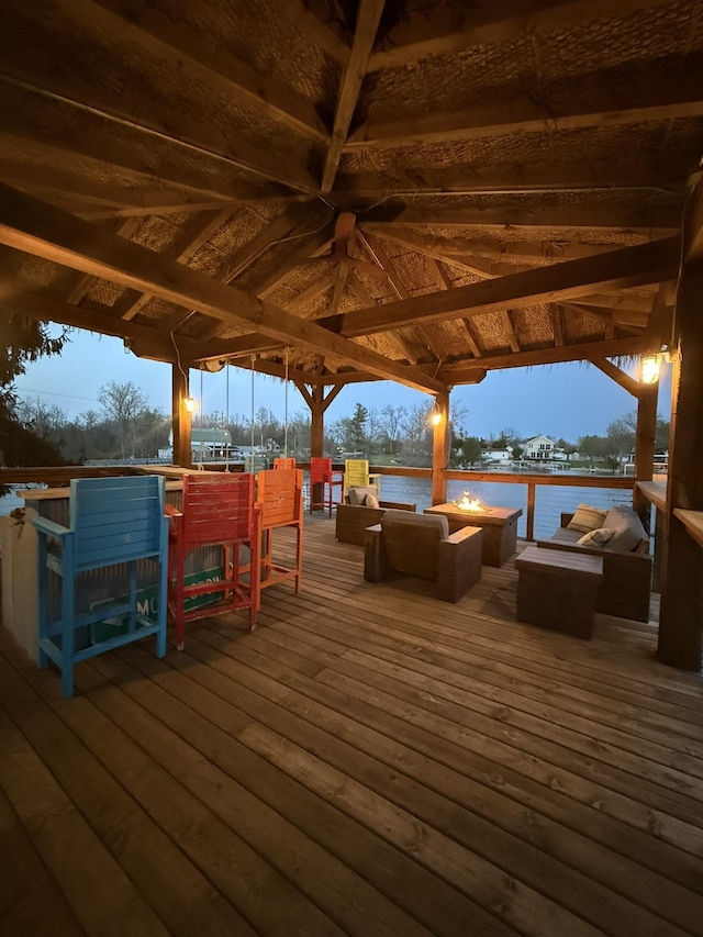 16191 Seymour Rd, Argentine, MI 48451 - deck featuring an outdoor living space with a fire pit, a water view, and a gazebo